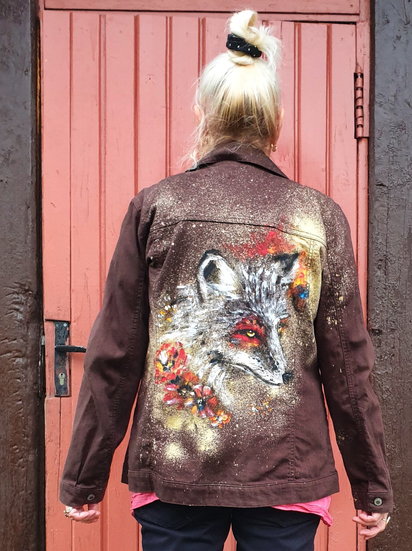 Back view showing detailed fox and floral artwork on the jacket