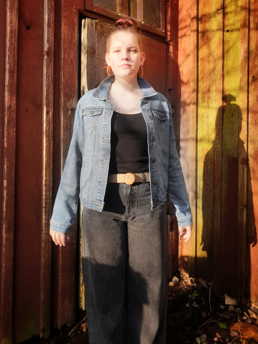 Front view of the “Jumpy Magic Mushrooms” hand-painted upcycled denim jacket by Hele Artwear.