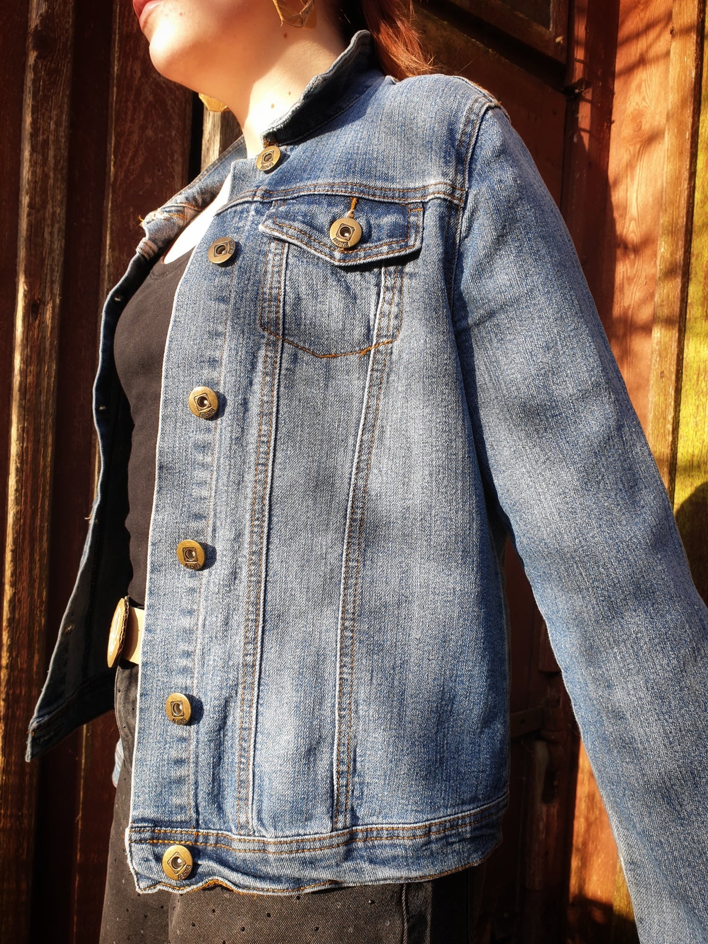 Side angle of the “Jumpy Magic Mushrooms” one-of-a-kind hand-painted denim artwear.2