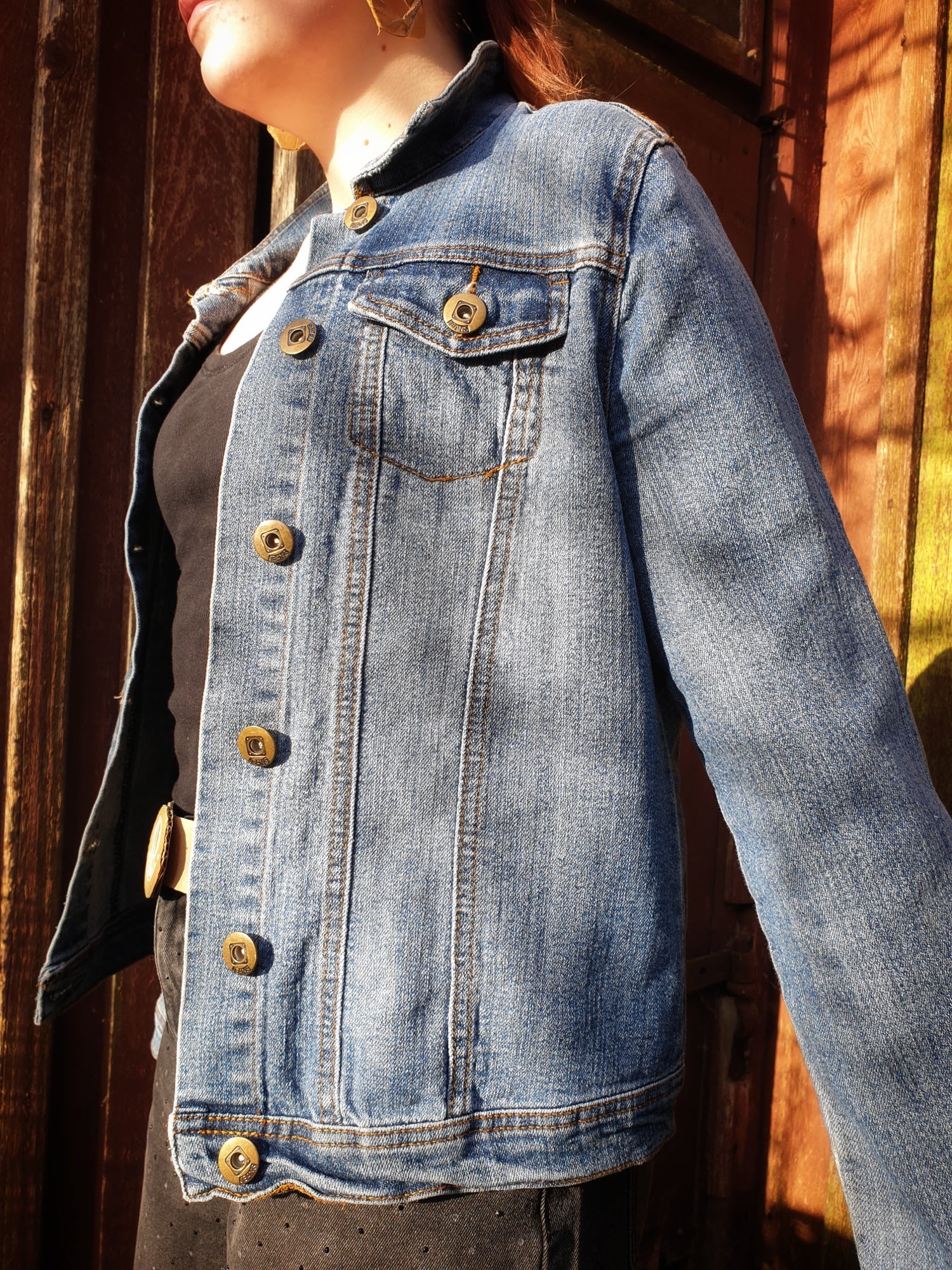 Side angle of the “Jumpy Magic Mushrooms” one-of-a-kind hand-painted denim artwear.2