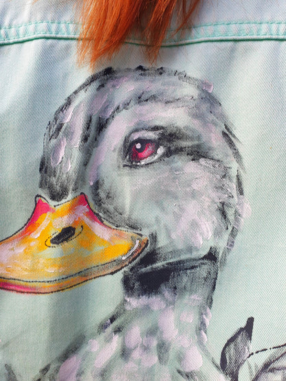 Detail of the duck artwork showing vivid brushstrokes and expressive color.