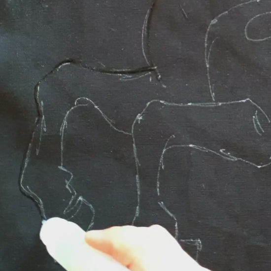 Detail of the horse artwork created using bleach, white, and blue textile paints.